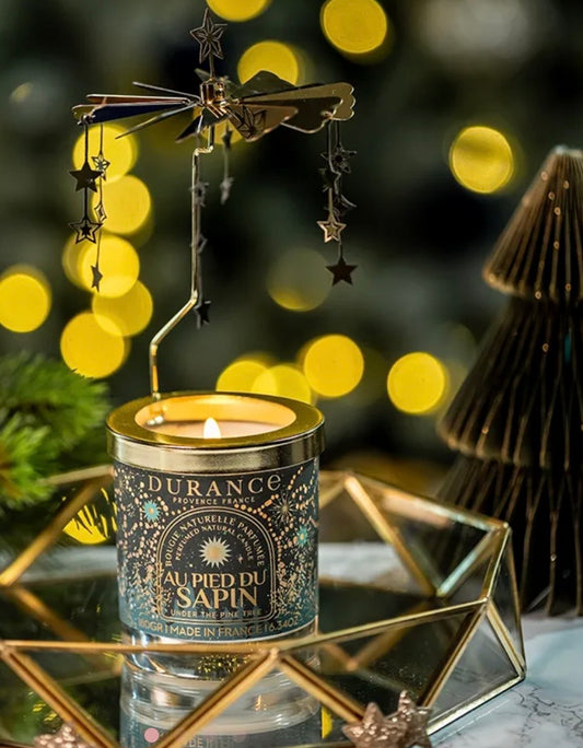 Carrousel bougie au pied du sapin