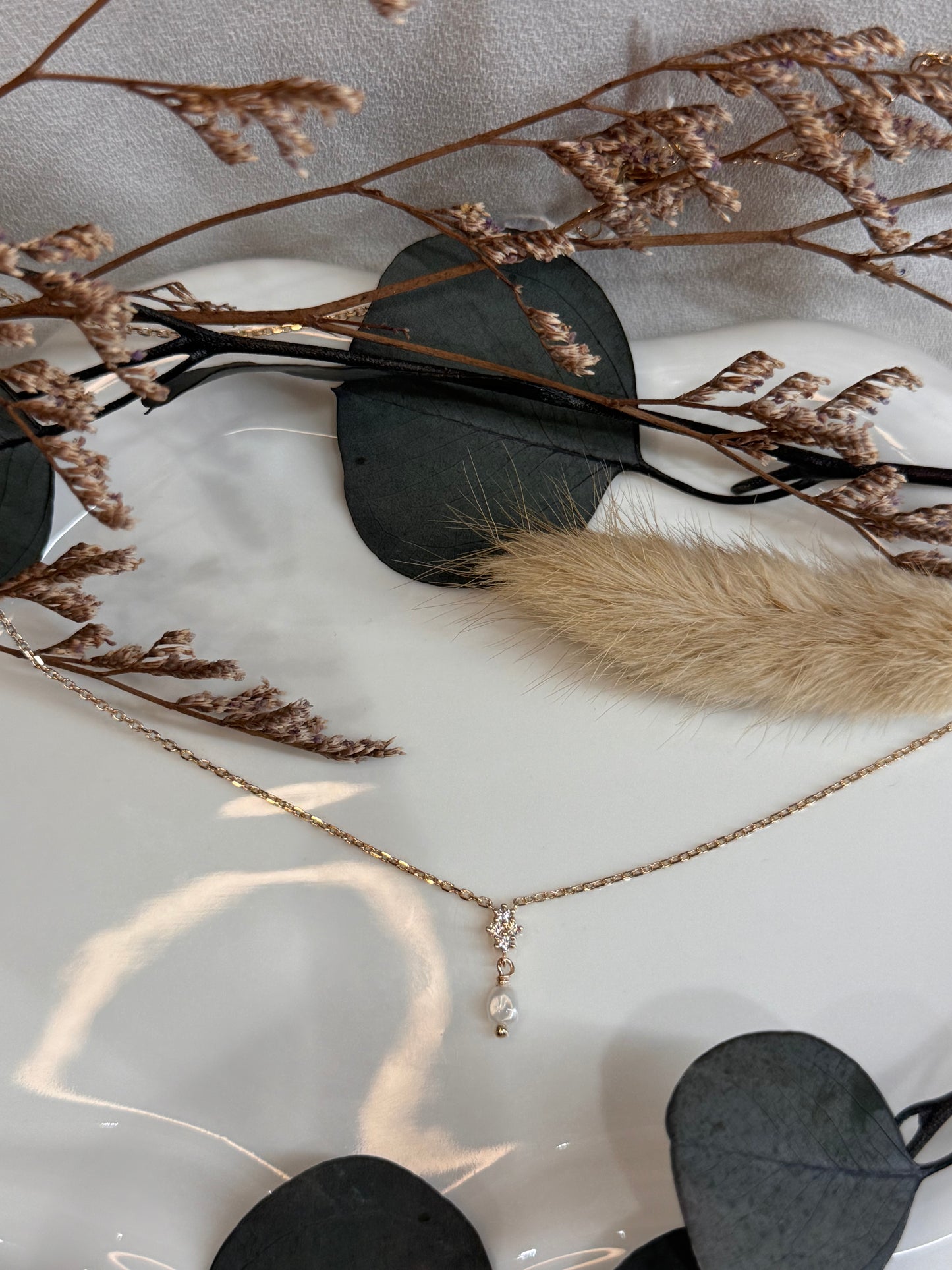 COLLIER GINA